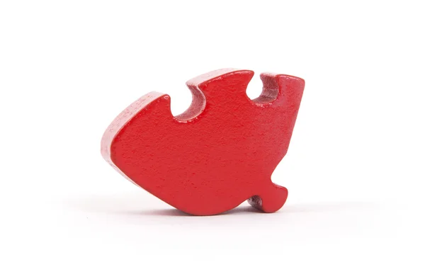 Closeup of big red jigsaw puzzle piece — Stock Photo, Image