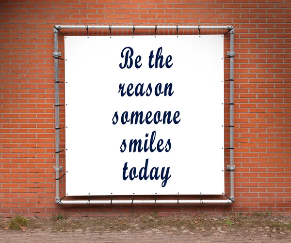 Large banner with inspirational quote on a brick wall — Stock Photo, Image