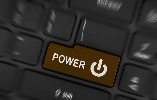 黑色笔记本键盘上的棕色电源按钮 — 图库照片
