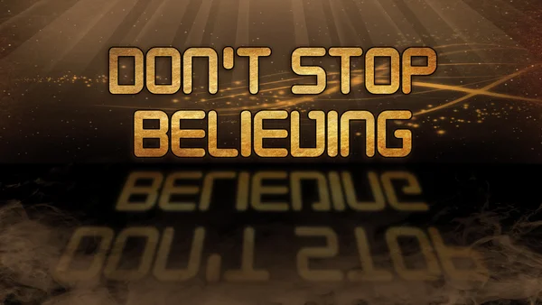 Gold quote - Don 't stop believing — стоковое фото