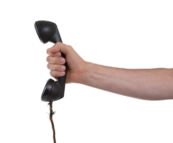 Male hand holding retro landline telephone — Stock Photo, Image