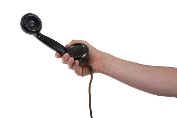 Male hand holding retro landline telephone — Stock Photo, Image