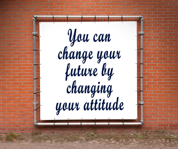 Large banner with inspirational quote on a brick wall — Stock Photo, Image