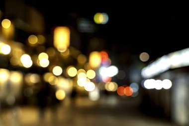 Scenery blurred and bokeh of refection lighting of cityscape in night time.