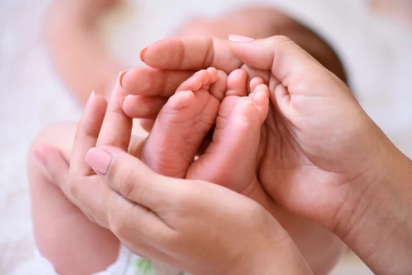 Pequeño pie de bebé recién nacido Imágenes de stock libres de derechos