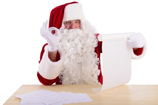 Kerstman leest een brief voor — Stockfoto