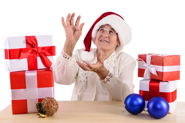 Old woman with gift box — Stock Photo, Image