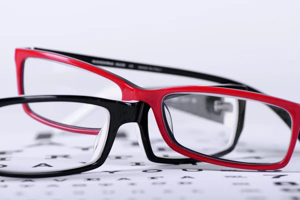 Dioptrické brýle a oční graf — Stock fotografie