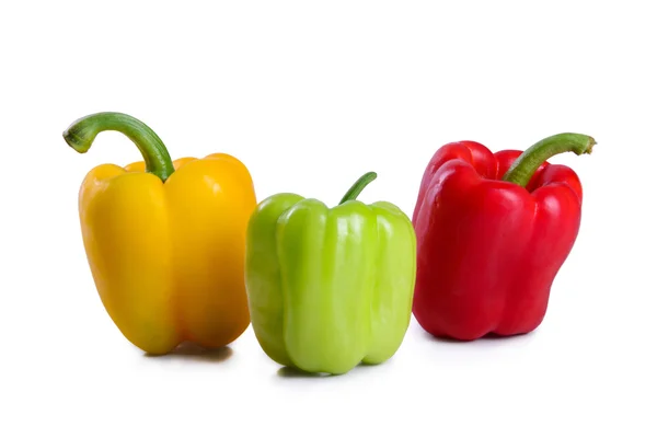 Três pimentas multicoloridas — Fotografia de Stock