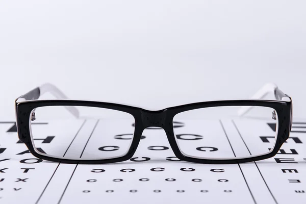 Eyeglass dan eye chart — Stok Foto