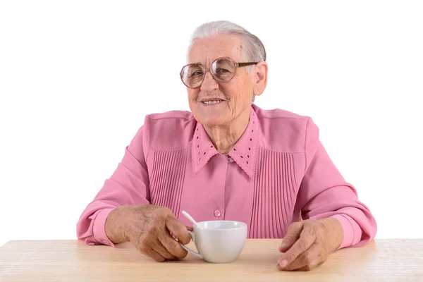 Mulher velha e xícara de chá — Fotografia de Stock