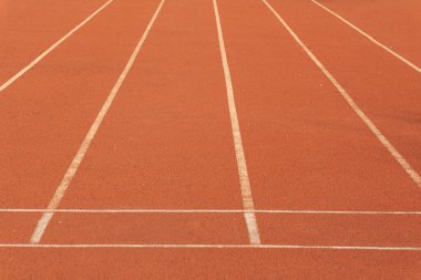 Atletik yarışma dokusu için koşu pisti. Arka plan kopyalama alanı olan antrenman sporu için yarış