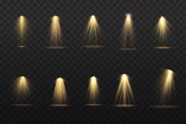 Sahnede sarı spot ışıkları parlıyor.