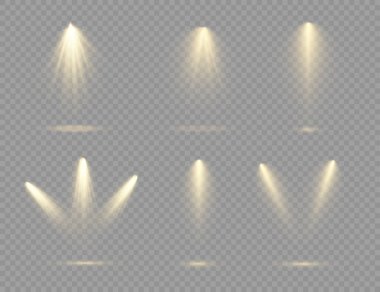 Sahnede sarı spot ışıkları parlıyor.