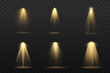 Sahnede sarı spot ışıkları parlıyor.