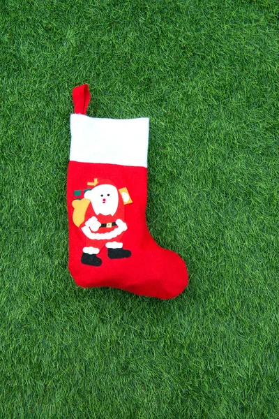 Christmas socks on Green grass — Stock Photo, Image