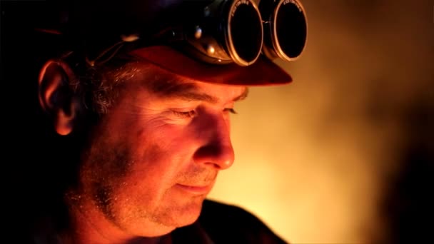 Worker with safety goggles in a foundry — Stock Video