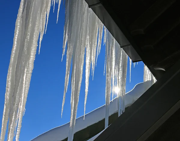 Roof icicles, wintertime — Stock Photo, Image