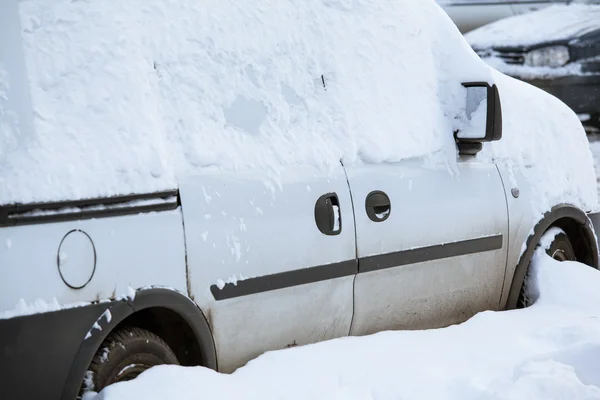 Snowbound car on the street — Stock Photo, Image