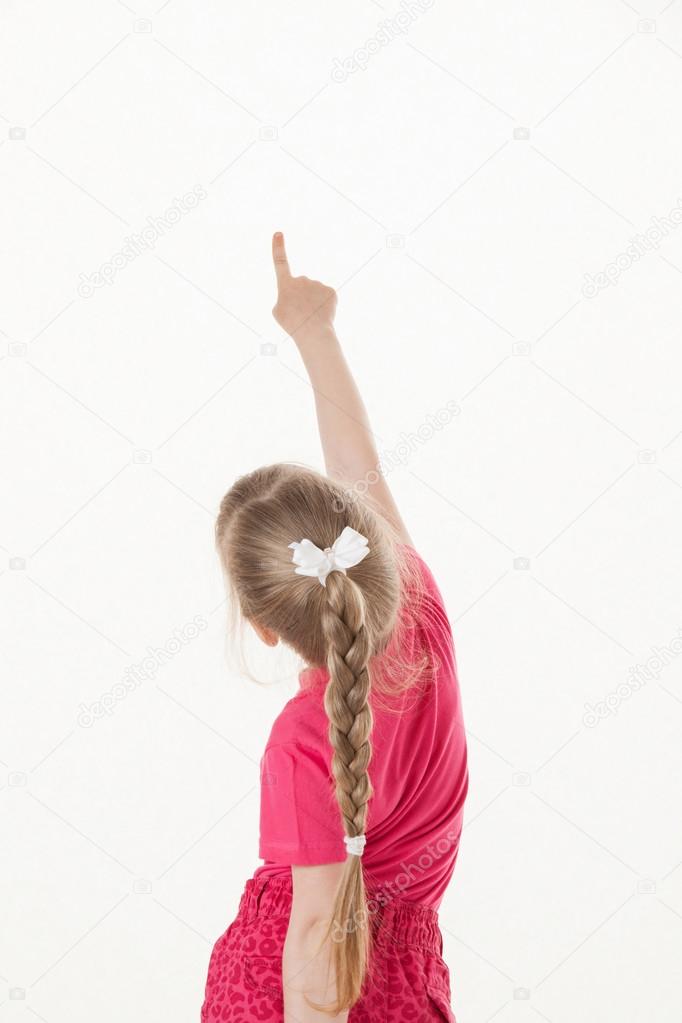 little girl turning back and indicating something up