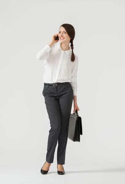 Businesswoman with mobile phone — Stock Photo, Image