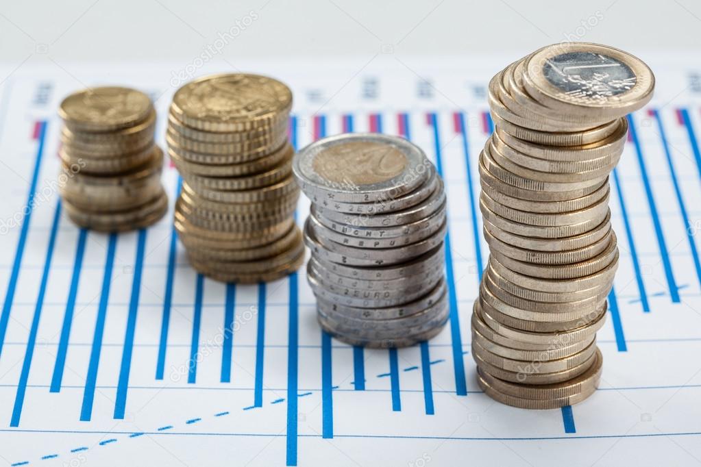 Four columns of coins on the table