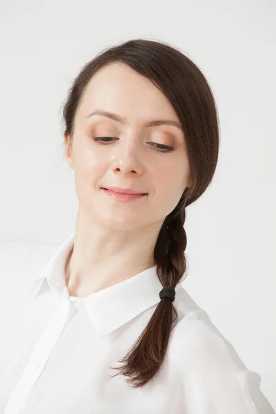 Portrait of a smiling young woman — Stock Photo, Image