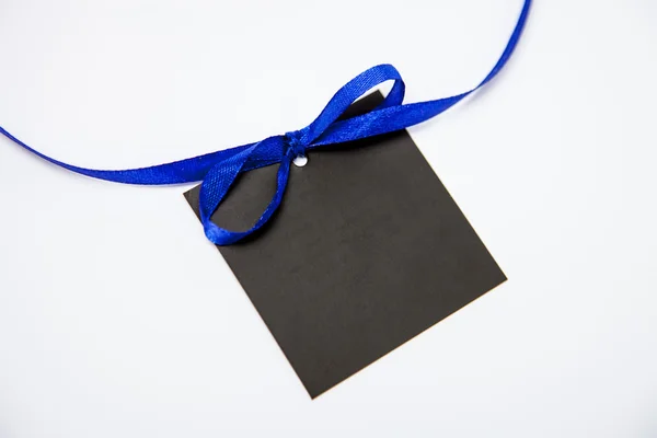 Carta nera vuota con fiocco — Foto Stock