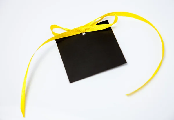 Empty black card with bow — Stock Photo, Image