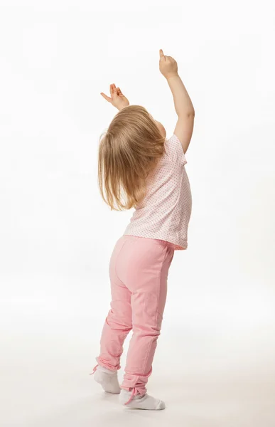 Pequena menina mostrando algo — Fotografia de Stock