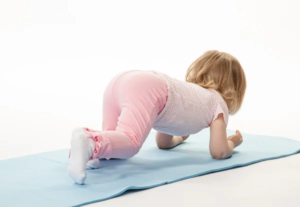 Pretty baby girl exercising — Stock Photo, Image