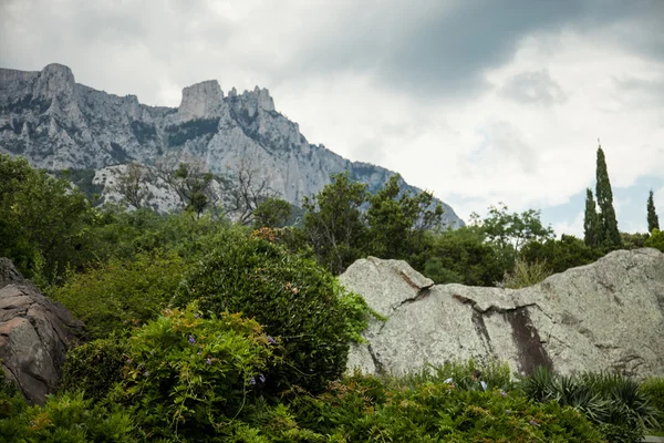 Mountains under rain clouds — Stock Photo, Image