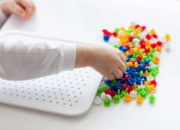 Little child playing with mosaic — Stock Photo, Image