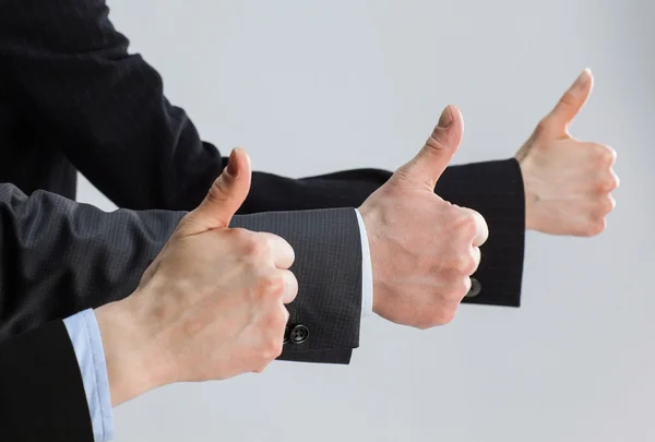 Successful team showing thumbs up — Stock Photo, Image