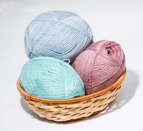 Woolen yarn in a  braided basket — Stock Photo, Image