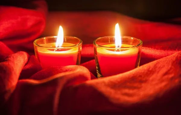 Two small burning candles — Stock Photo, Image