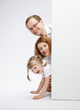 Boş afişini ile mutlu aile