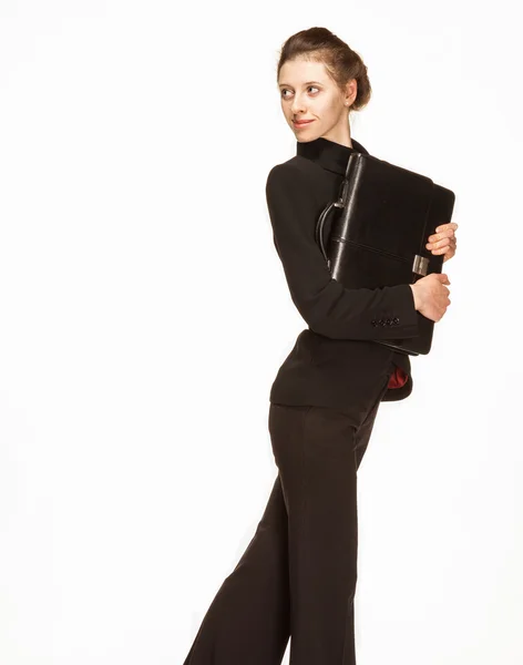 Mujer joven en un traje de negocios con maletín — Foto de Stock