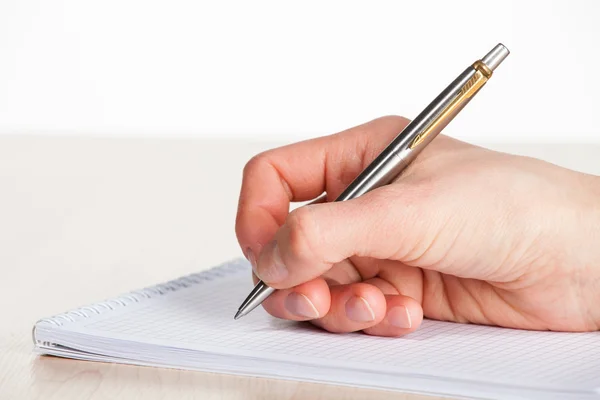 Human hand making notes on the paper — Stock Photo, Image