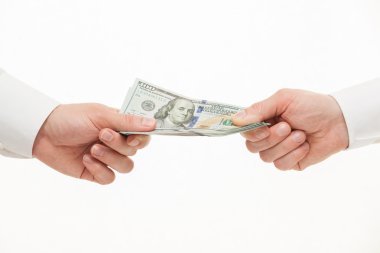 Businesspeople's hands holding dollars clipart