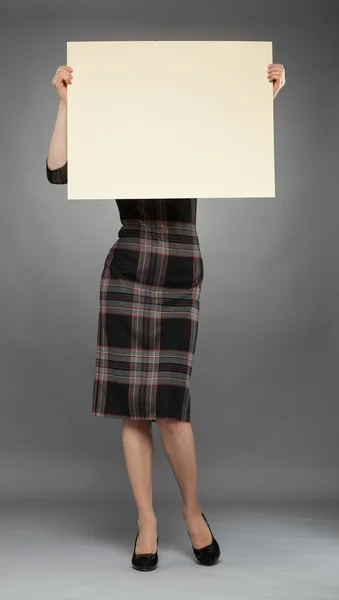 Woman holding poster — Stock Photo, Image