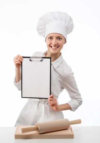 Chef sonriente mujer cocinero sosteniendo portapapeles en blanco —  Fotos de Stock