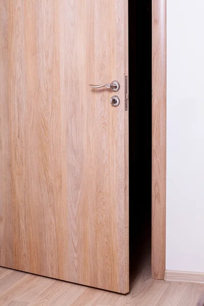 Room with door ajar — Stock Photo, Image