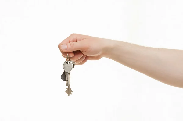 Man's hand holding a bunch of keys — Stock Photo, Image