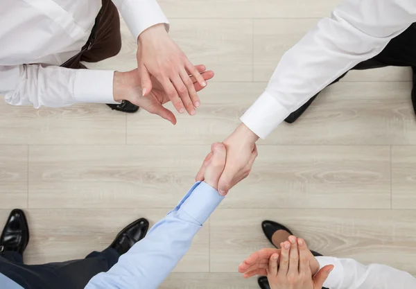 Businessmen shake hands