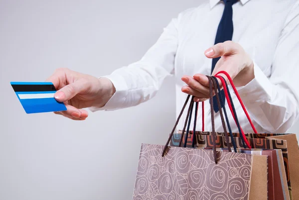 Geschäftsfrau mit Taschen — Stockfoto