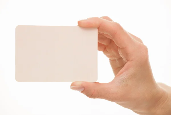 Female hand holding a  paper card — Stock Photo, Image