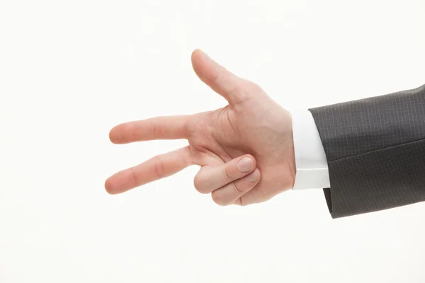 Businessman counting off on his fingers — Stock Photo, Image