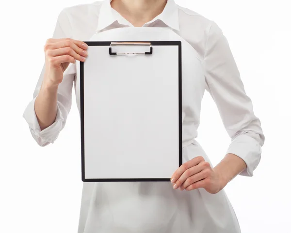 Woman cook's hands showing blank clipboard — Stock Photo, Image