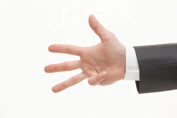 Businessman counting off on his fingers — Stock Photo, Image